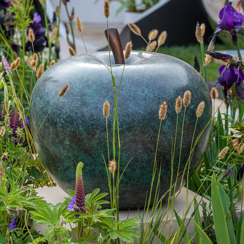 Medium scale bronze apple sculpture by James Parker suitable for interior or garden settings.