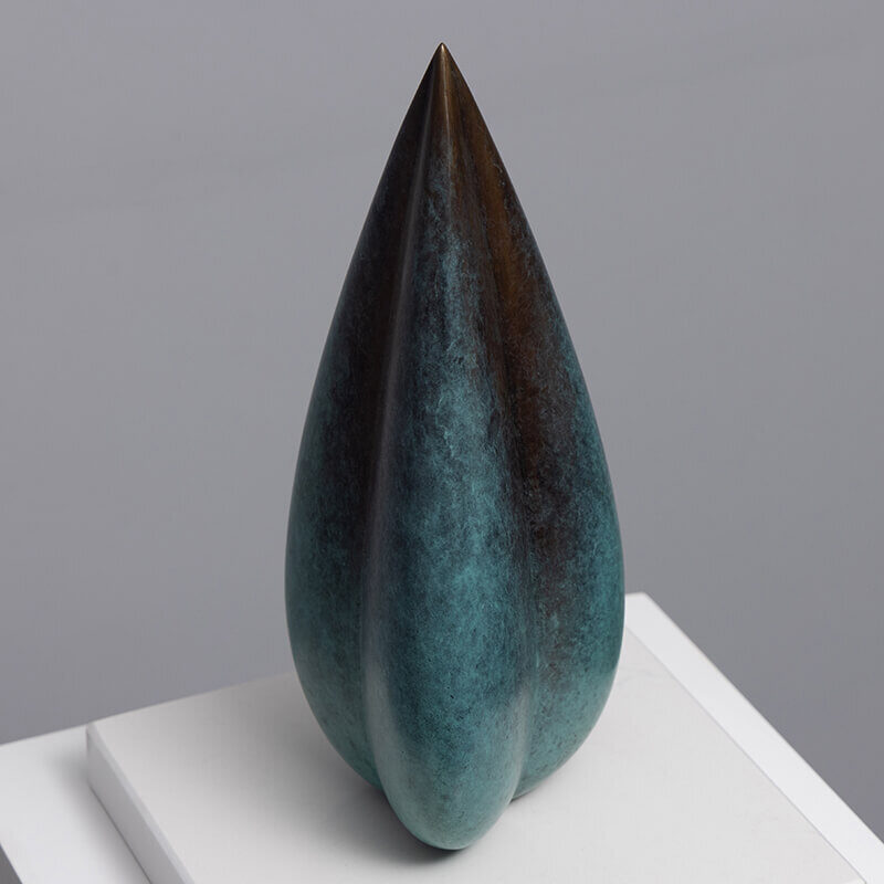 Limited edition bronze Bud sculpture by James Parker at 30cm height on a white quartzite base