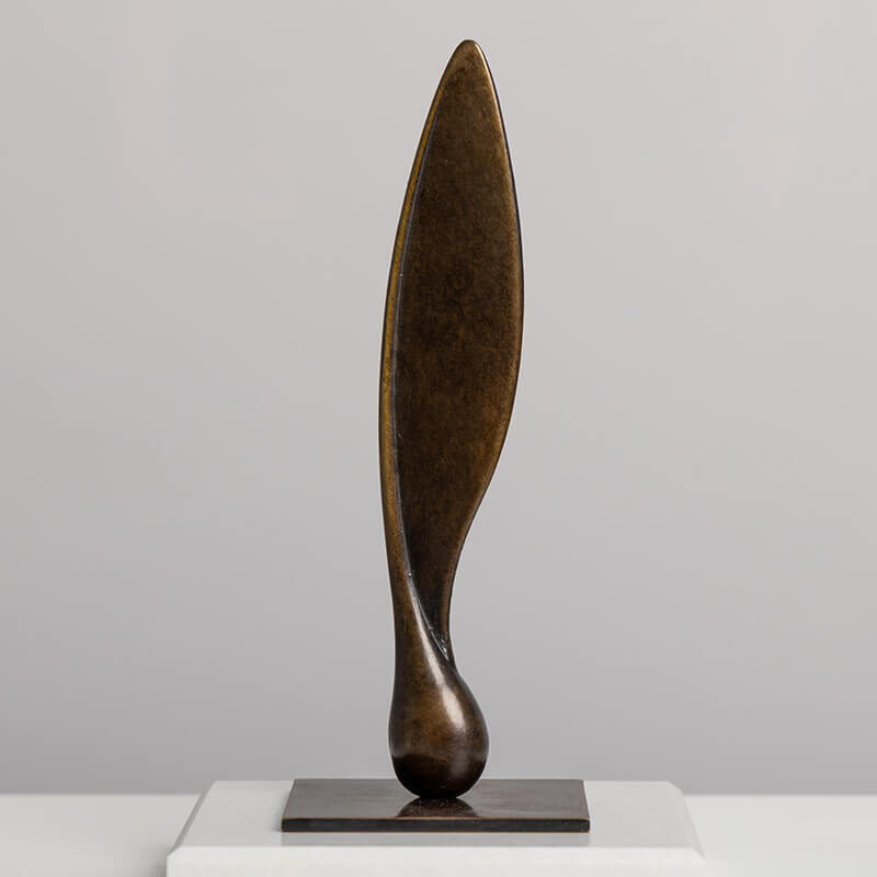 Small-scale Sycamore Seed bronze sculpture by James Parker displayed in a gallery setting
