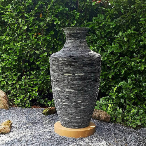 Fa’side Urn stacked slate sculpture by James Parker, hand-built from Lakeland Blue slate as a contemporary Grecian stone vessel form.