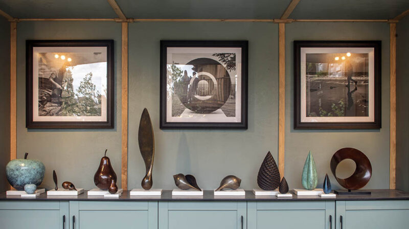 Interior of James Parker’s RHS Chelsea Flower Show stand displaying limited edition bronze sculptures inspired by nature.