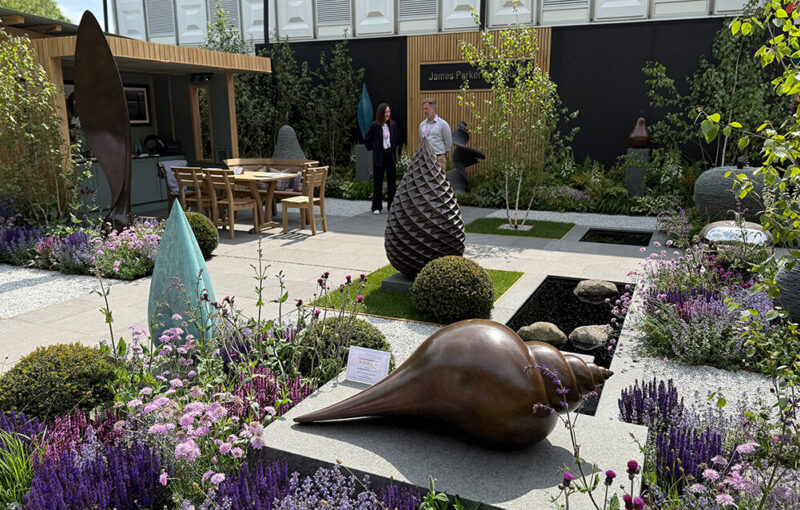 James Parker Sculpture Main Avenue stand at RHS Chelsea 2025, bronze Pine Cone and stainless steel forms set within a designed planting scheme
